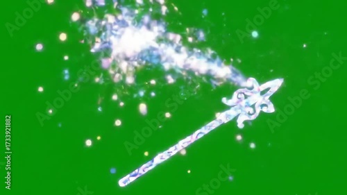 A glowing crystalline magic wand casting a spell with a trail of sparkling particles on a green screen background for visual effects