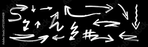 Graffiti arrow set in vector style white strokes made with ink or chalk, paintbrush, crayon and charcoal. Bold comic drawing collection of comic drawing elements for street graffity collage