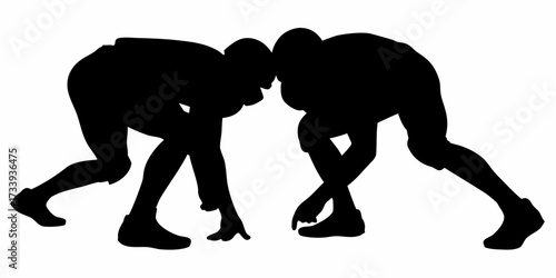 Two wrestlers locked in intense combat, a dynamic silhouette capturing the power and struggle of competitive sports and athletic prowess.