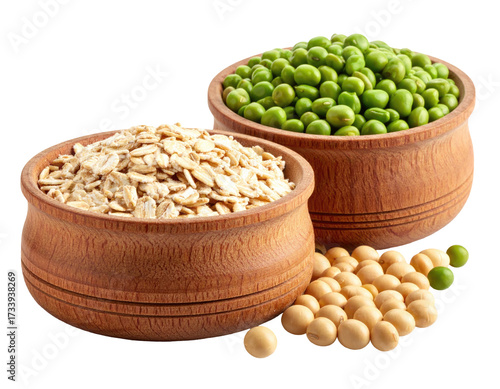 Wooden bowls filled with oats, peas, and soybeans, healthy food choices