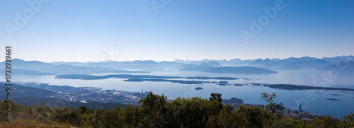 A fantastic view rom the Varden viewpoint over the Norwegian town of Molde, the fjord with the many islands and the famous panorama with over 220 peaks with most mountain tops over 1000 meters high