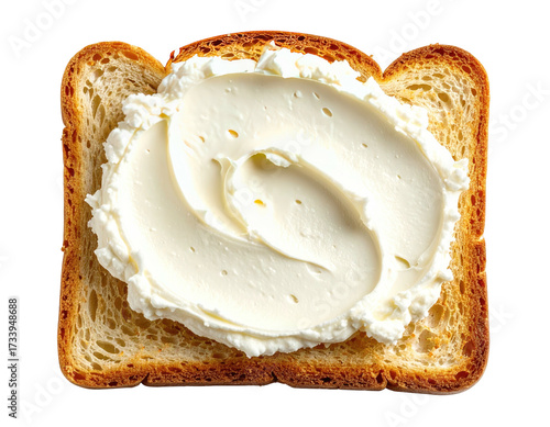 Close-up of toasted bread slice with generous swirls of smooth, white spread