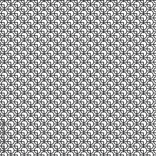 A black and white pattern with a lot of circles

