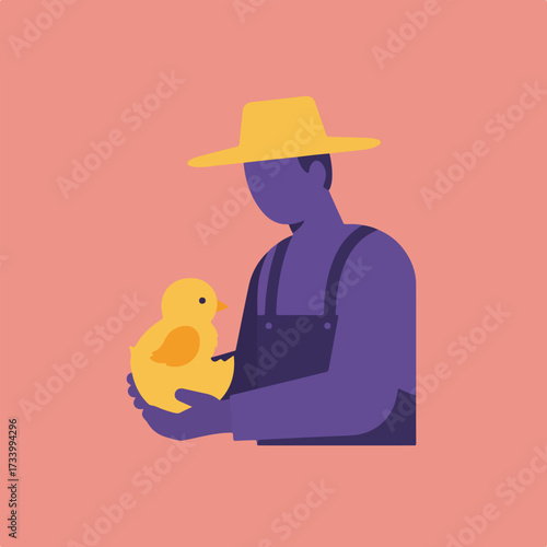Person in overalls and hat holds a yellow chick gently