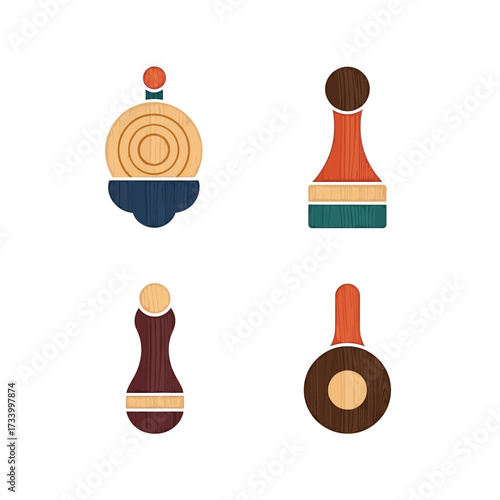 Set of four colorful wooden spinning tops and chess pawns.