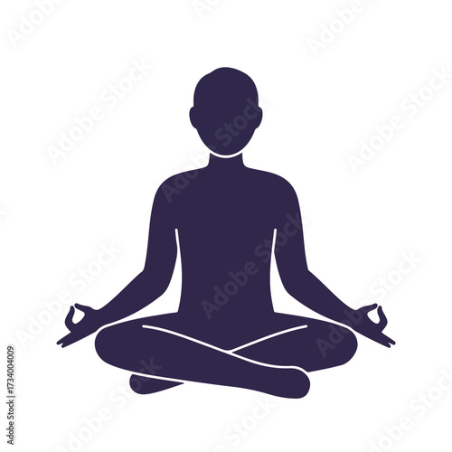 Silhouette of a person meditating in a lotus position