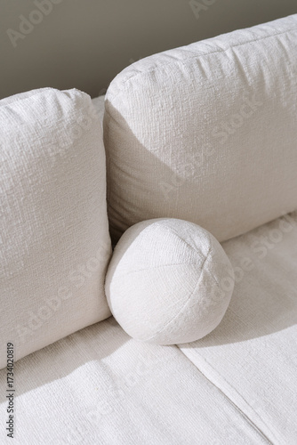 Minimalist couch design with soft textures in a cozy living room setup