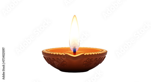 Earthen diya lamp with flame, traditional symbol of Diwali festival.