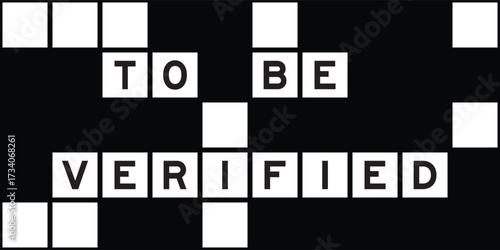 Alphabet letter in word to be verified on crossword puzzle background