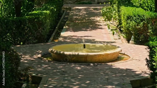 Serenity in a garden with a peaceful fountain