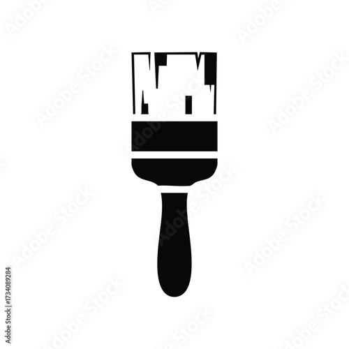 Close-up of a paintbrush with a wooden handle and synthetic bristles, on a plain