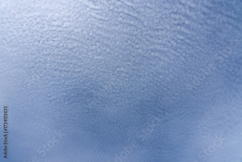 Photos Blue sky with soft altocumulus clouds forming wave-like texture