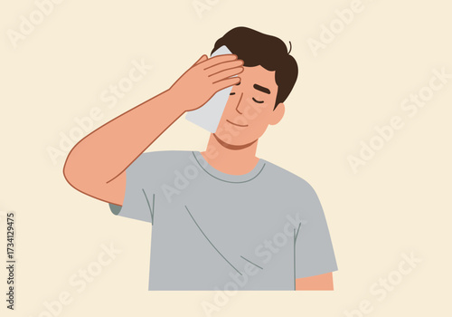 Refreshing relief young man wipes sweat home setting digital calm environment perspective
