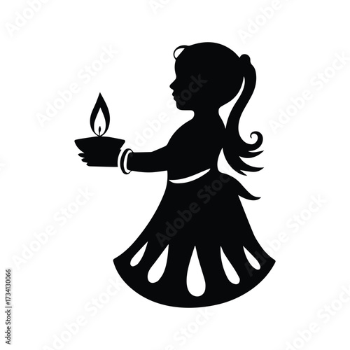 Silhouette of a young girl holding a diya oil lamp with a flame silhouette