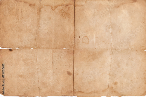 Distressed Old Paper Texture Background. Old vintage paper folded in four. Brown crumpled and folded parchment rustic paper sheet with space for text