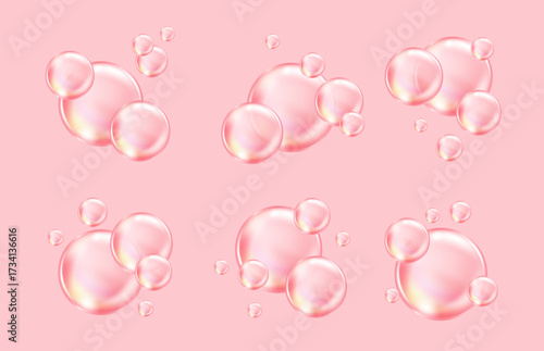 Set of floating pink bubbles on a light background.