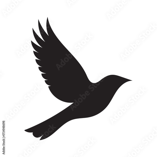 Graceful silhouette of a black bird in mid-flight capturing freedom and movement against a clean canvas silhouette