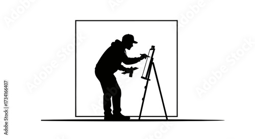 Dedicated artist creating masterpiece on canvas, focused on creative process in studio setting.