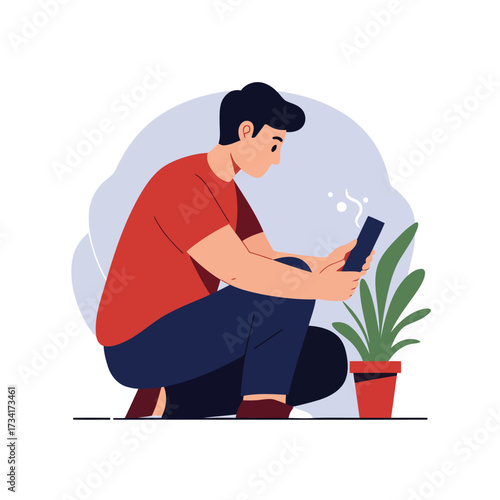 Man checking phone near a potted plant