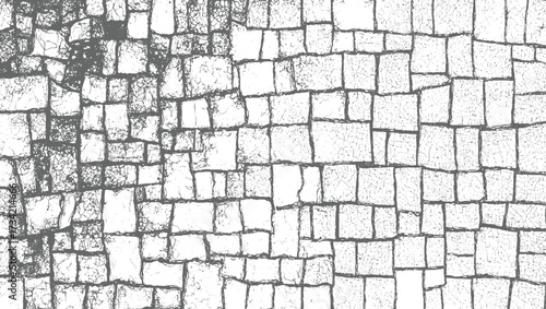 close up view of a grey and white cracked stone pavement texture with irregular shapes.