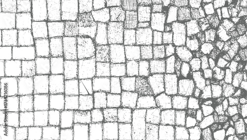grey and white textured pattern of irregular stone blocks with rough, cracked surfaces.