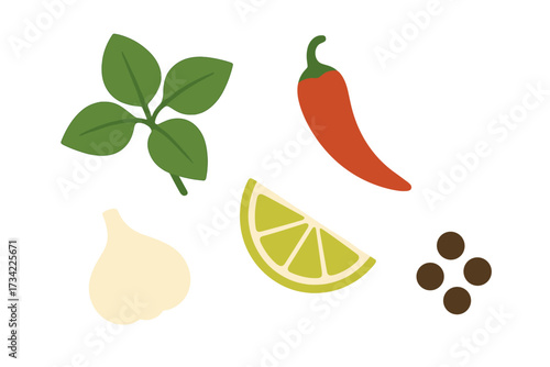 Assortment of fresh cooking ingredients including aromatic basil leaves garlic bulb red chili pepper lime wedge and peppercorns