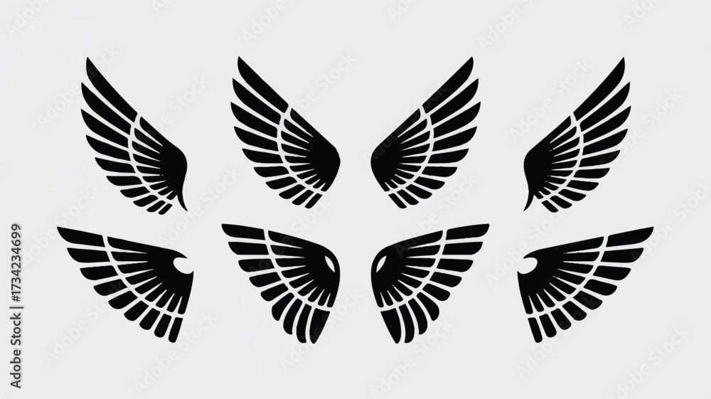 Obraz premium A minimalist set of six black wing silhouettes arranged in two rows against a white background. 
