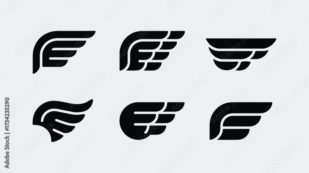 Obraz premium A minimalist set of six black wing silhouettes arranged in two rows against a white background. 