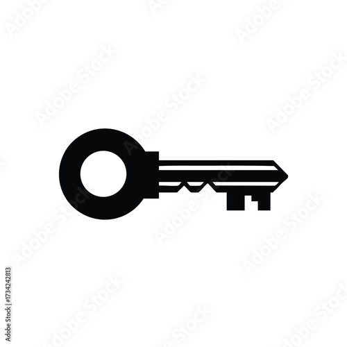 Close-up of a classic metal key with a round head and a notched blade, on a plain for security and access control