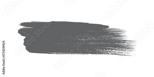 Dark grey grunge brush stroke. Hand-painted abstract ink stain element isolated on a white background.