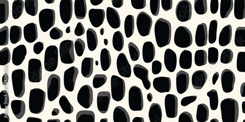 Black, organic blobs on off-white