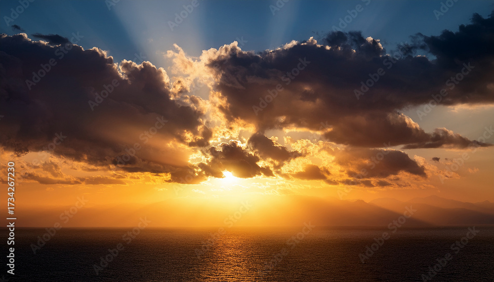 Fototapeta premium Cloudy Sunset With Sun Peeking Through