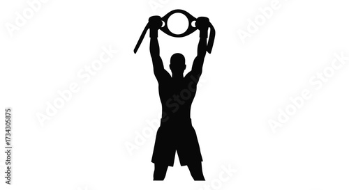 Man triumphantly raising a circular object above his head silhouette