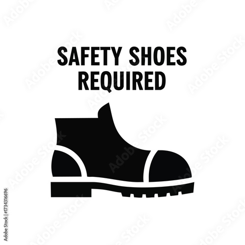 Close-up of a sturdy safety work boot with reinforced toe cap and rugged sole designed for industrial environments and heavy-duty tasks