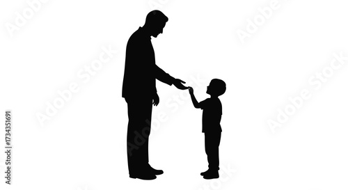 A father and son share a touching moment a dark silhouette