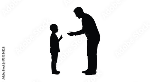 Father and son communicating a poignant moment captured in silhouette