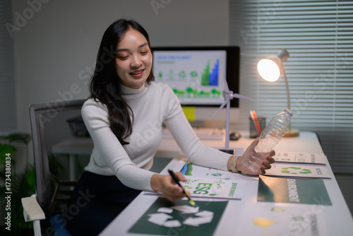 Woman working on sustainability and ESG strategy in office