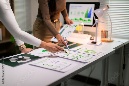 Businesswomen analyzing ESG strategy for corporate sustainability development