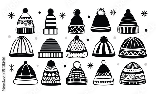 Many winter hats are scattered around the frame in a playful black and white pattern