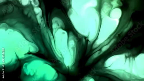 Abstract fluid art forms with green and black colors dynamic movement