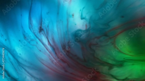 Abstract fluid art with colorful paint mixing vibrant textures and artistic patterns