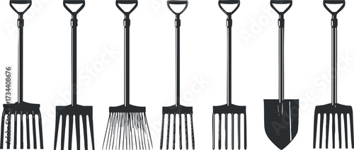 A collection of various gardening tools including shovels rakes and pitchforks for outdoor work..