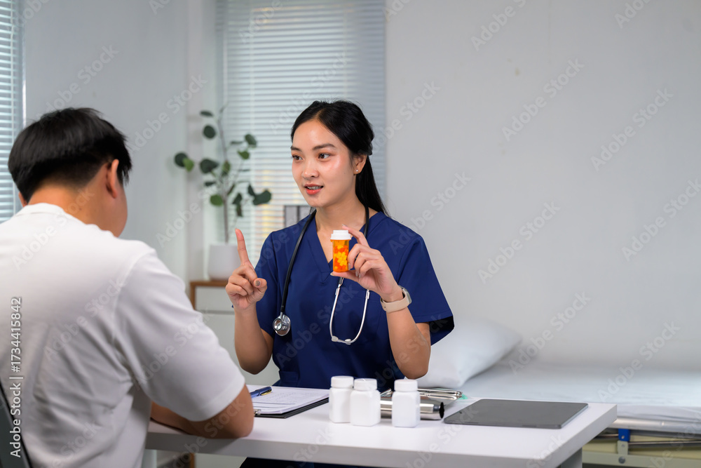 Fototapeta premium Doctor discussing medicine with patient during consultation