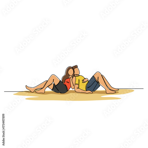 Couple relaxing together on sandy beach during summer day  