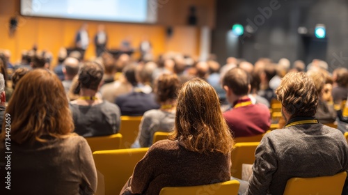 Wallpaper Mural Engaging Audience at a Business Conference in a Modern Venue Torontodigital.ca