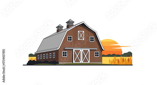 A classic wooden barn stands tall against a vibrant sunset with golden fields in the background.