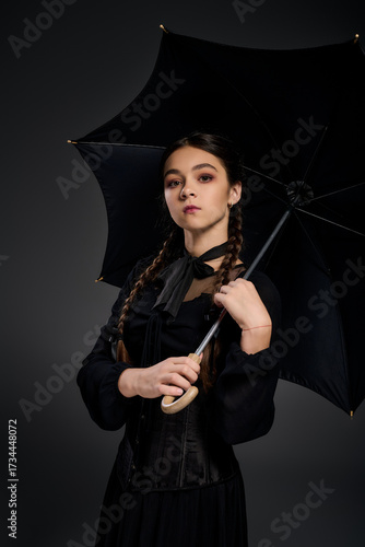 Wallpaper Mural Girl with braided hair in gothic dress embraces spooky season spirit Torontodigital.ca