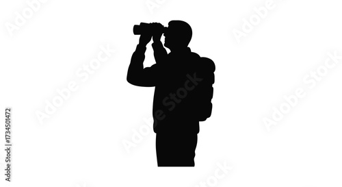 A man using binoculars looking intently at a distant view silhouette
