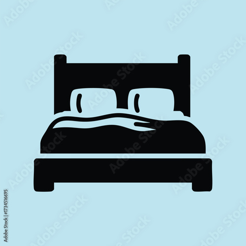 Minimalist Bed with Two Pillows and a Simple Headboard in a Calm Light Blue Room