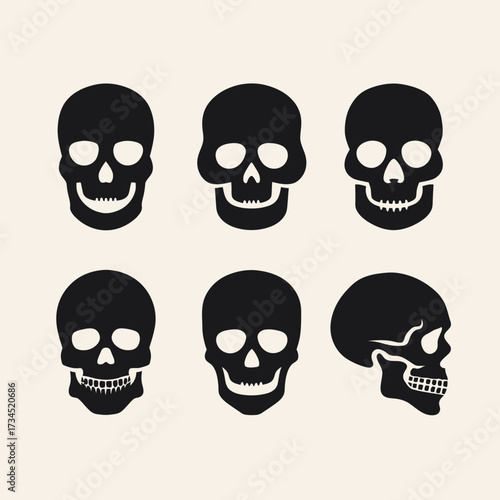 Skull Silhouettes in Various Views on a Neutral Background